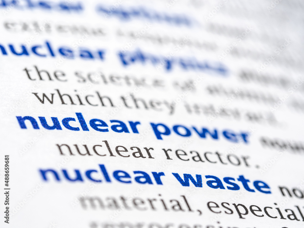 Nuclear power - English dictionary definition of the word - photo of a dictionary page with paper grain texture - selective focus on the word Nuclear power - English dictionary definition of the word - photo of a dictionary page with paper grain texture - selective focus on the word