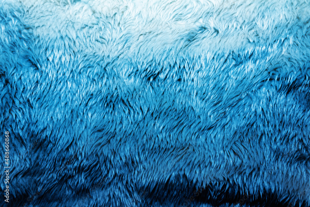 Backdrop close-up photo texture of blue colored fur material. Backdrop close-up photo texture of blue colored fur material.