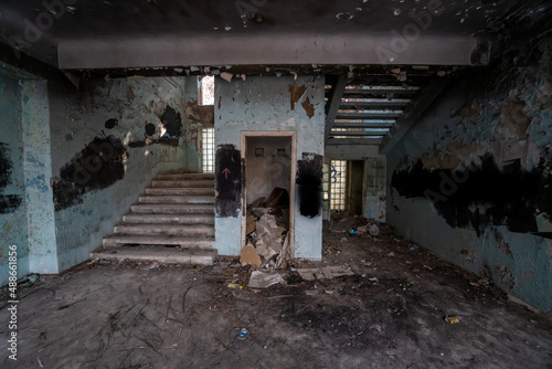 war. building after the bombing. destroyed building. old abandoned building. Old stairs of an abandoned house. old room interior