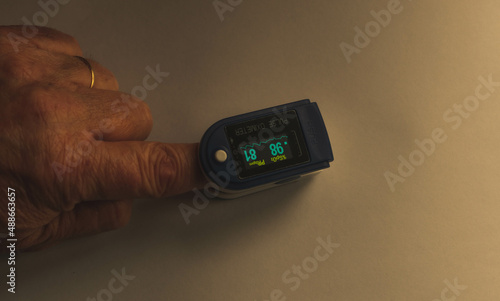 pulse oximeter on the finger photo