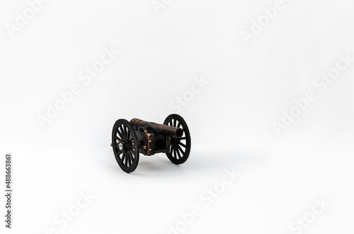 Cannon shaped sharpener. Cannon toy isolated on white.