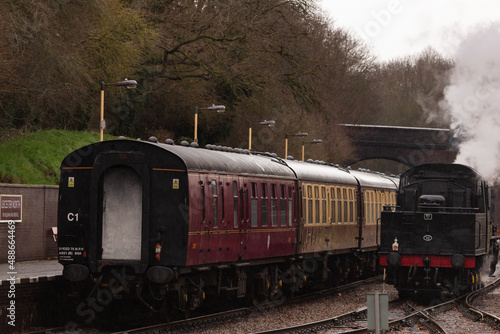 Vintage steam train on station