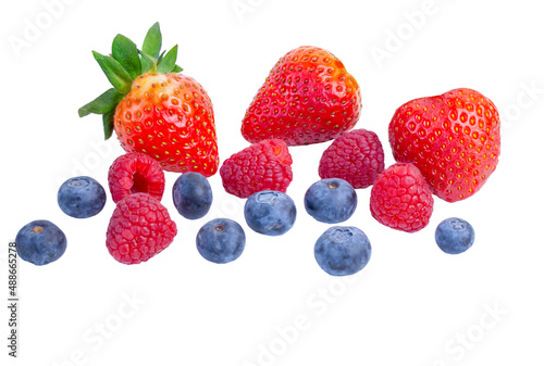 strawberries, raspberries and blueberries isolated on a white background
