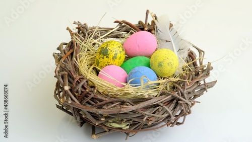 Easter eggs in nest. Holiday celebration concept. Minimal holiday season concept background