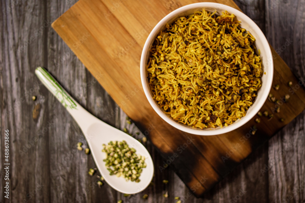 SPROUT RICE INSIDE WHITE SERVING BOWL WITH BLACK BACKGROUND SPROUT RICE INSIDE WHITE SERVING BOWL WITH BLACK BACKGROUND