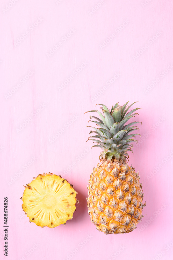 Fresh pineapple fruit on pink background, Tropical fruit Fresh pineapple fruit on pink background, Tropical fruit