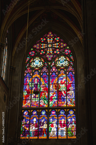 Church vitrage glass, stained glass mandalas. Interior Votive Church, Votivkirche, neo-Gothic style. 