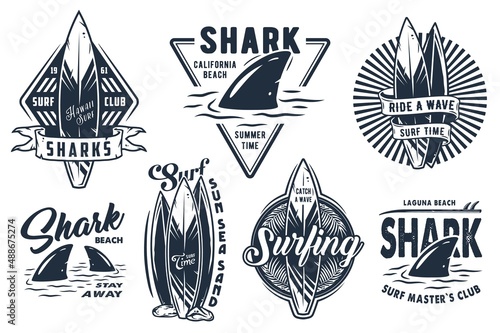 Surf board for summer surfing on the waves collection. Shark and surfboard emblems.