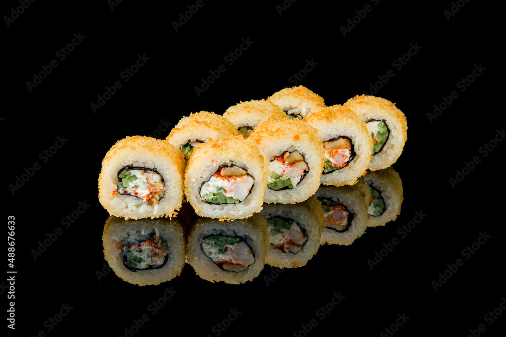 Hot roll with shrimp and eel on black with reflection Hot roll with shrimp and eel on black with reflection