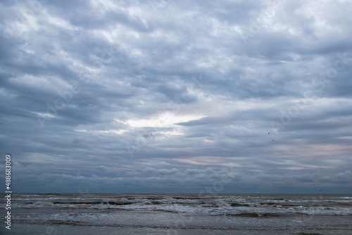 Ocean  beach and storm sky