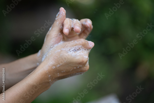 young woman person hand hygiene cleaning with wipe cleaner  body health concept