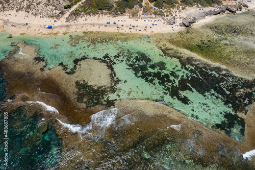 Aerial view of Yallingup beach with reef and beachgoers photo