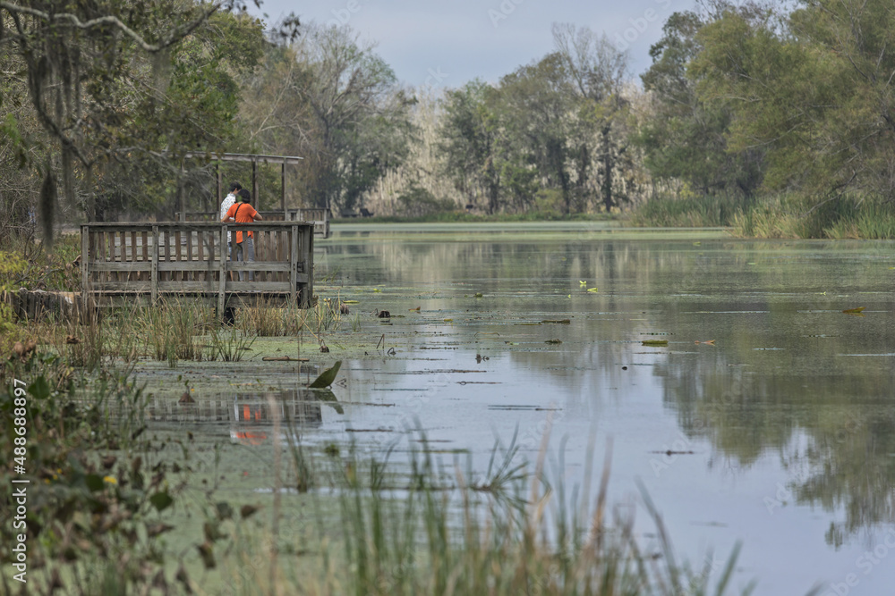 Brazos Bend State Park, Texas - October 22, 2021: Tourists on the viewing platform enjoying a day at the Texas park