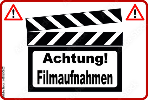 Schild Achtung Filmaufnahmen Drearbeiten mit Filmklappe
