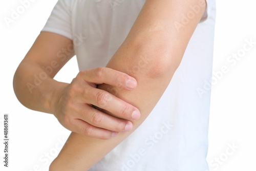 Men use their hands to hold their elbows and He had pain at the elbows. Painful Health and medical concepts © Photo Sesaon