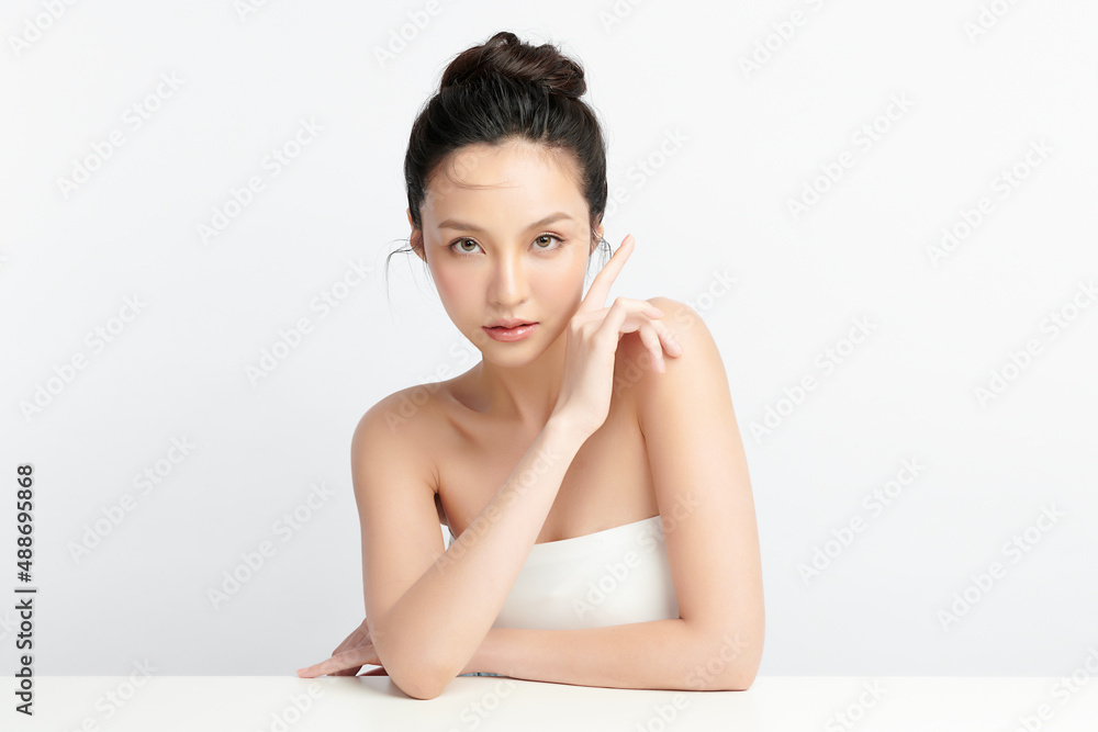 Beautiful young asian woman with clean fresh skin on white background, Face care, Facial treatment, Cosmetology, beauty and spa, Asian women portrait. Beautiful young asian woman with clean fresh skin on white background, Face care, Facial treatment, Cosmetology, beauty and spa, Asian women portrait.