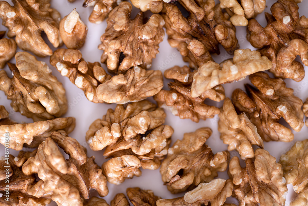 Walnuts background. Kernels walnuts. Top view. Vegetarian or healthy eating. Walnuts background. Kernels walnuts. Top view. Vegetarian or healthy eating.