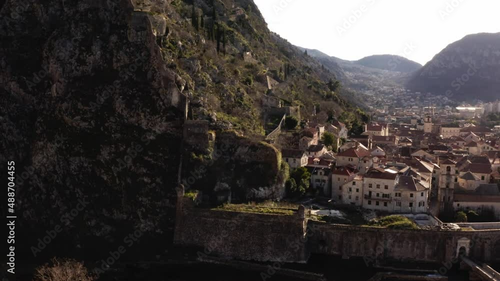 AERIAL - Kotor and its ancient city walls, Montenegro, a UNESCO World Heritage Site AERIAL - Kotor and its ancient city walls, Montenegro, a UNESCO World Heritage Site