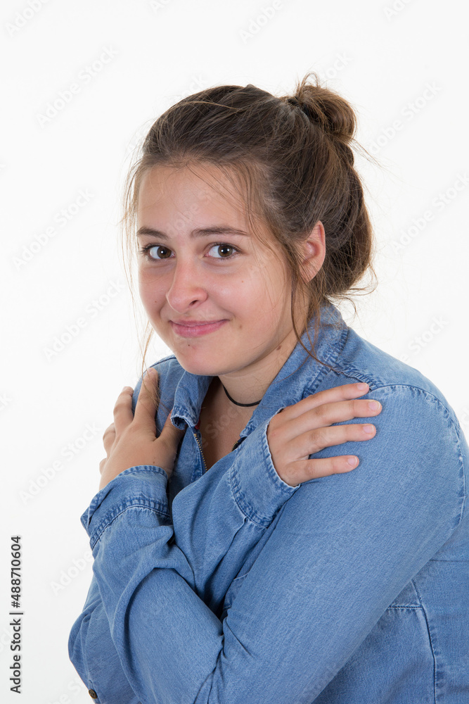 young woman teenager girl arms crossed on white background young woman teenager girl arms crossed on white background