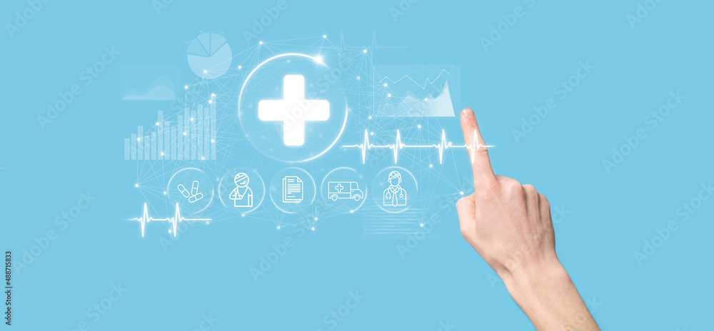 Businessman hold virtual plus medical network connection icons. Covid-19 pandemic develop people awareness and spread attention on their healthcare.Doctor,document,medicine,ambulance,patient icon. Businessman hold virtual plus medical network connection icons. Covid-19 pandemic develop people awareness and spread attention on their healthcare.Doctor,document,medicine,ambulance,patient icon.