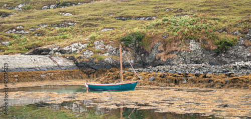 Little boat in a bay of the Isle of Colonsay, Inner Hebrides, Scotland