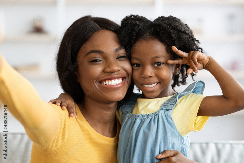 Happy Young Black Mother Taking Selfie With Little Daughter At Home, Pov Happy Young Black Mother Taking Selfie With Little Daughter At Home, Pov