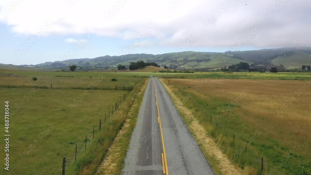 Aerial View Of Concrete Road Between Rural Fields In San Luis Obispo, California, USA. Aerial View Of Concrete Road Between Rural Fields In San Luis Obispo, California, USA.