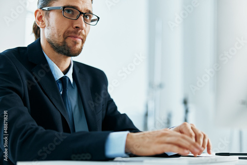 business man wearing glasses work desk computer office manager