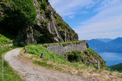 Old military road in the mountains above Lake Maggiore offering splendid views. Lombardy, Italy.