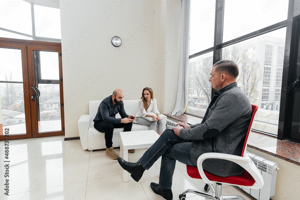 A young married couple came to an appointment and consultation with a psychotherapist. Counseling and help during depression and solving family problems. A young married couple came to an appointment and consultation with a psychotherapist. Counseling and help during depression and solving family problems.