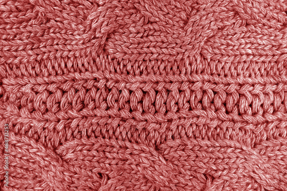 Warm knitting texture in red color. Warm knitting texture in red color.