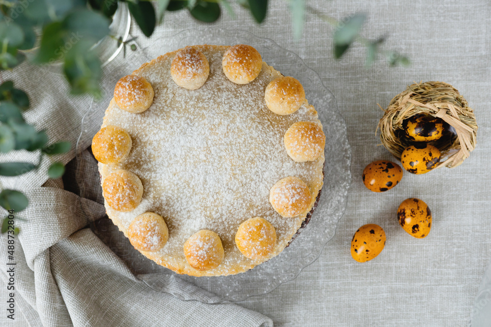 Easter cake simnel for breakfast on a grey background. Easter cake simnel for breakfast on a grey background.