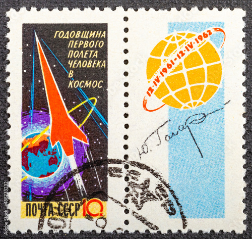 USSR - CIRCA 1962: A retro post stamp, printed in USSR and devoted the one year anniversary of the first mans flight , shows the portrait of astronaut Gagarin. Circa 1962.