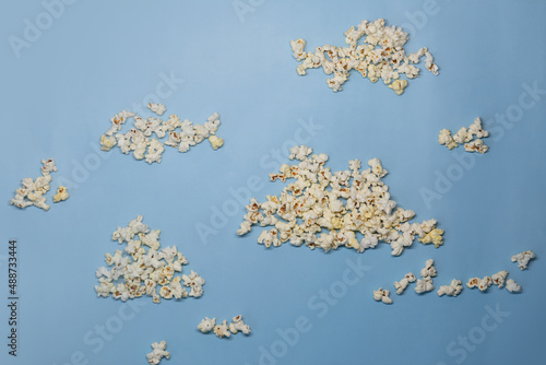 Clouds of popcorn on a blue background