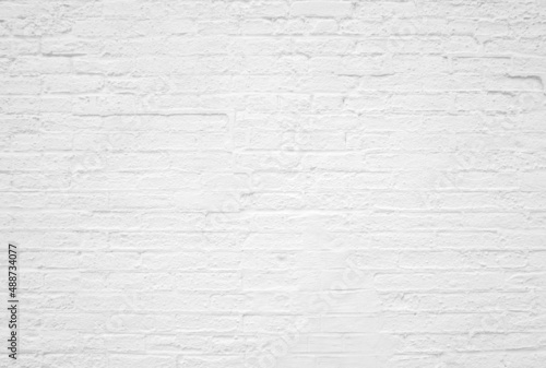 Weiße Backsteinwand - Steinmauer in weiß als Hintergrund photo