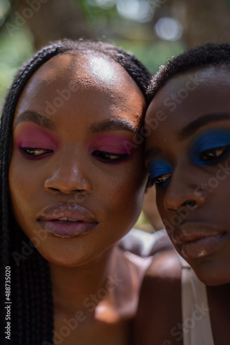 Close up portrait of two young african women 