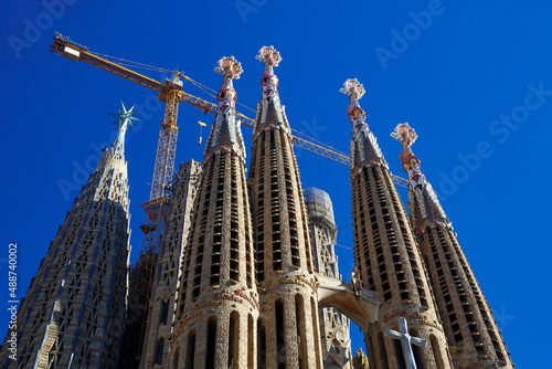 Construction of Sagrada Familia in Barcelona. Cranes above the church.