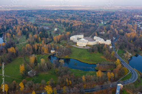 Panoramic aerial view of the Pavlovsk Park and the Pavlovsk Palace on an autumn evening.Bright autumn landscape, Slavyanka river. A suburb of St. Petersburg. photo