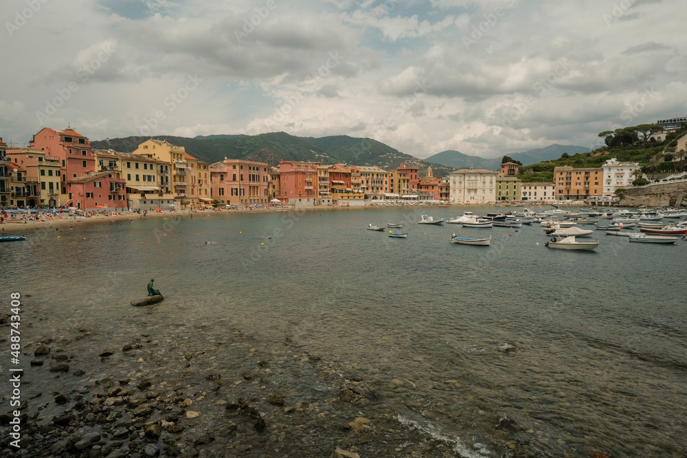 Scenic panorama view of the bay of the Silence in Sestri Levante, Liguria, Italy across the colorful houses, mountains and coastline	
