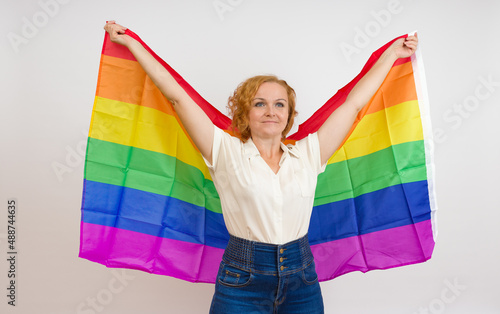 woman with rainbow flag, white background
