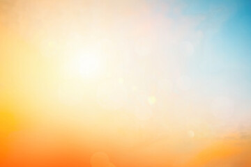 Relaxing outdoors vacation landscape concept: Abstract blurred sunlight beach colorful blurred bokeh background with retro effect autumn sunset sky have blue bright, white, and color orange calm.