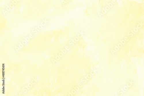 Yellow colored abstract textured background. Decorative plaster on the wall