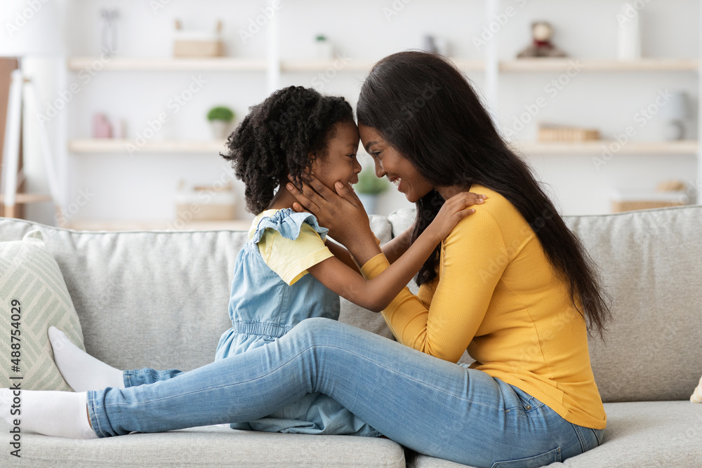 Mom And Child. Happy Black Mother And Little Daughter Bonding At Home