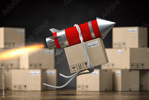 Fast delivery packet or parcel concept. Rocket with cardpoard box. photo