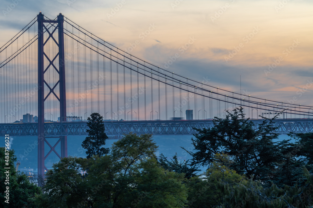 25 de Abril bridge at sunset in Lisbon, Portugal 25 de Abril bridge at sunset in Lisbon, Portugal