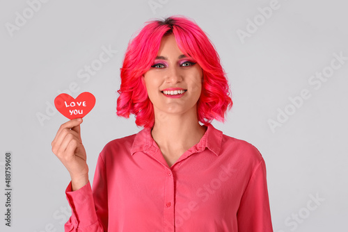 Stylish woman with bright h...