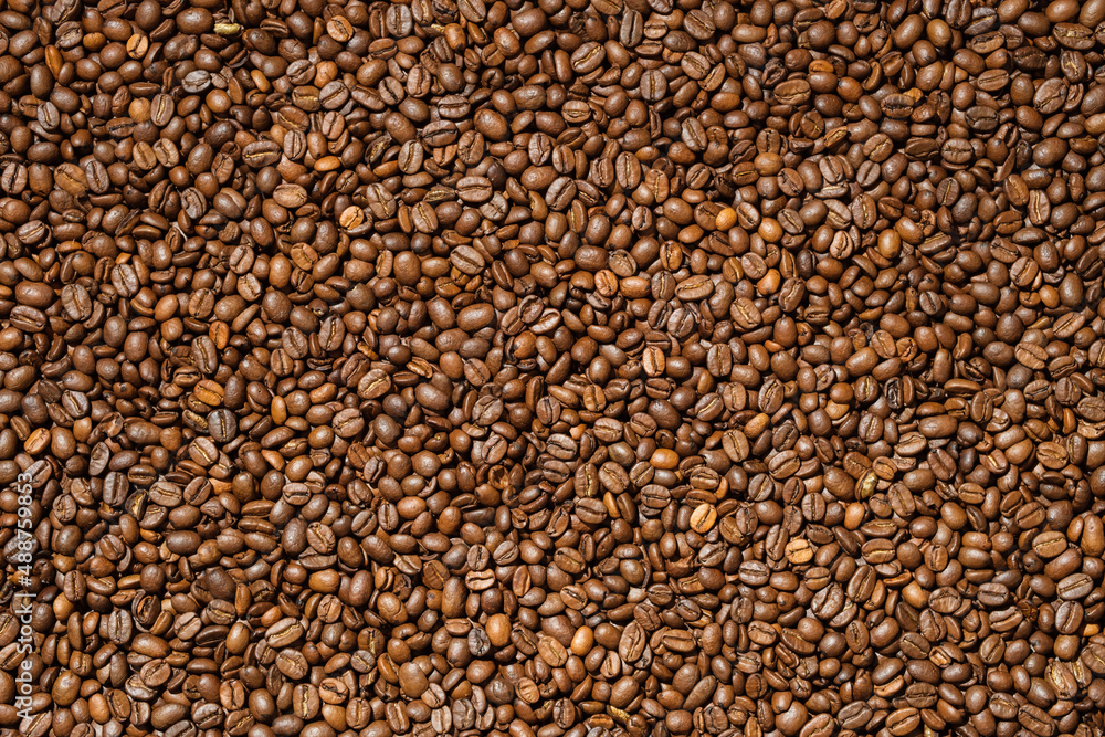 Background from fresh roasted aromatic coffee beans. Background from fresh roasted aromatic coffee beans.