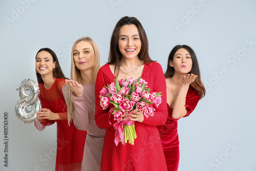 Beautiful women with bouque...