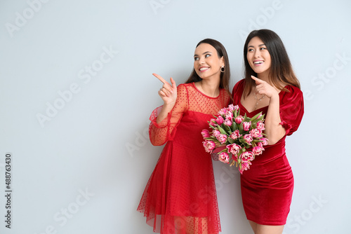 Beautiful women with bouque...