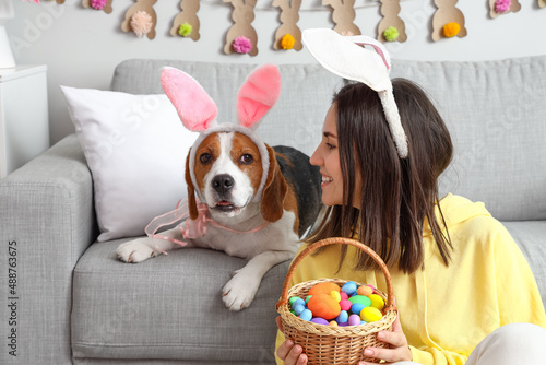 Young woman and cute Beagle...